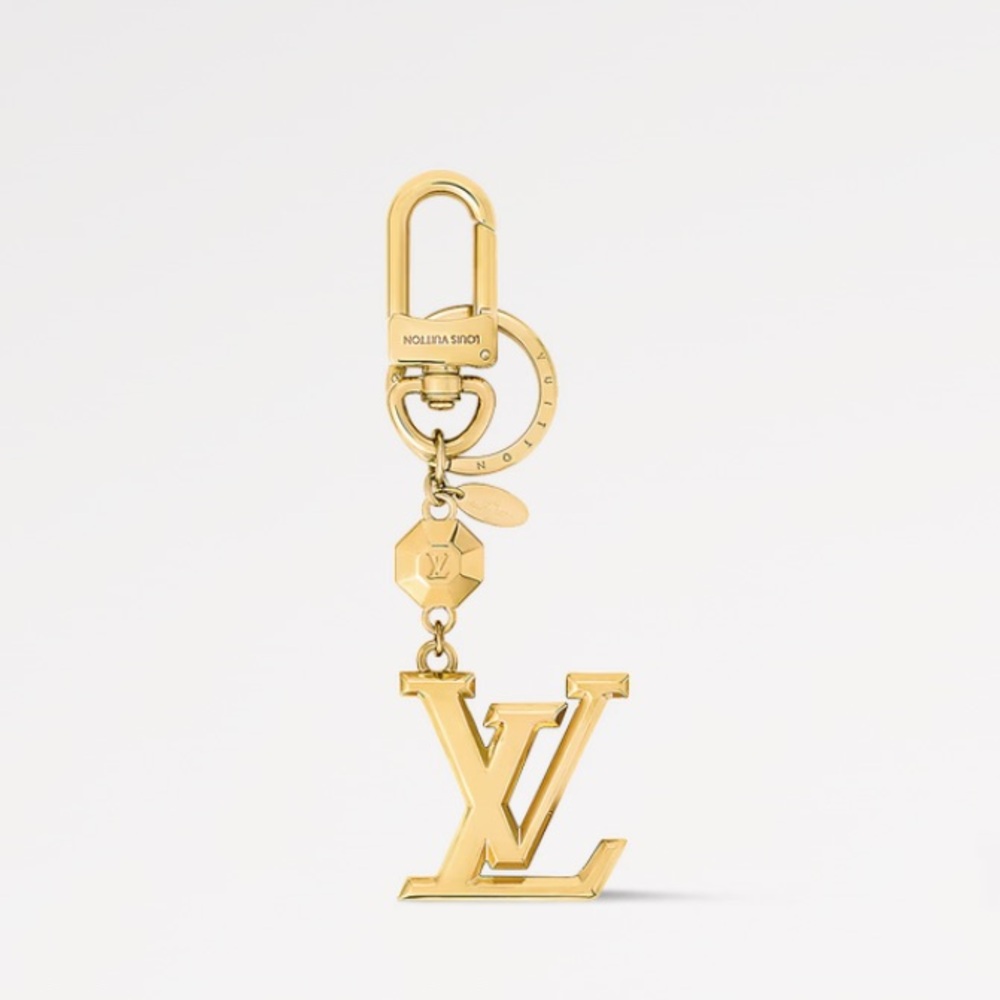 Authentic Louis Vuitton LV facettes bag charm and key holder.